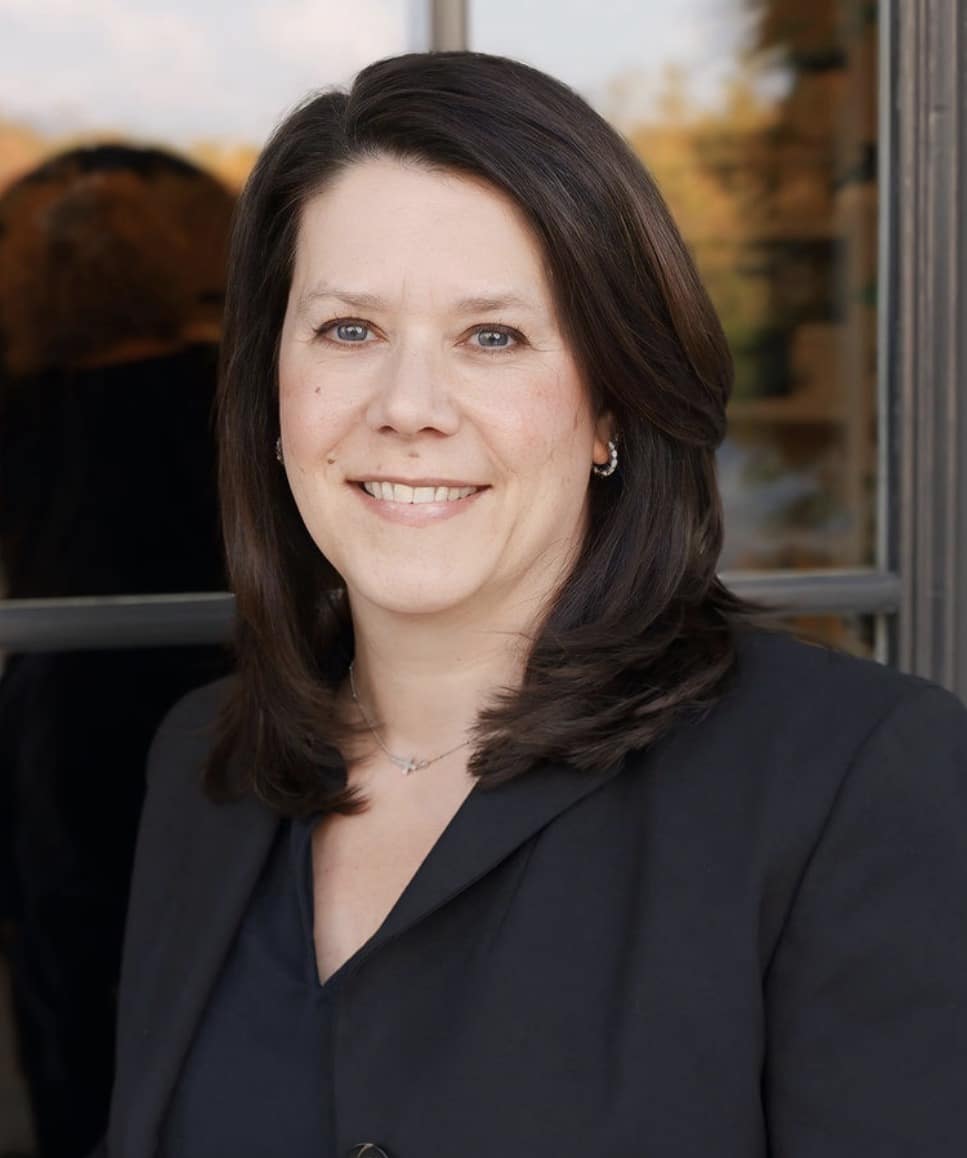 Paula Mitchell smiling for the camera